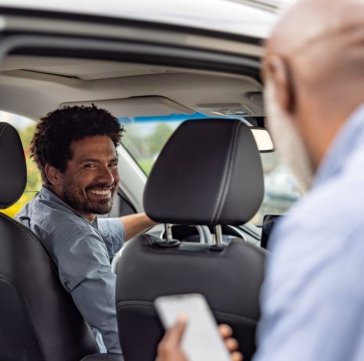Chauffeur opening car door